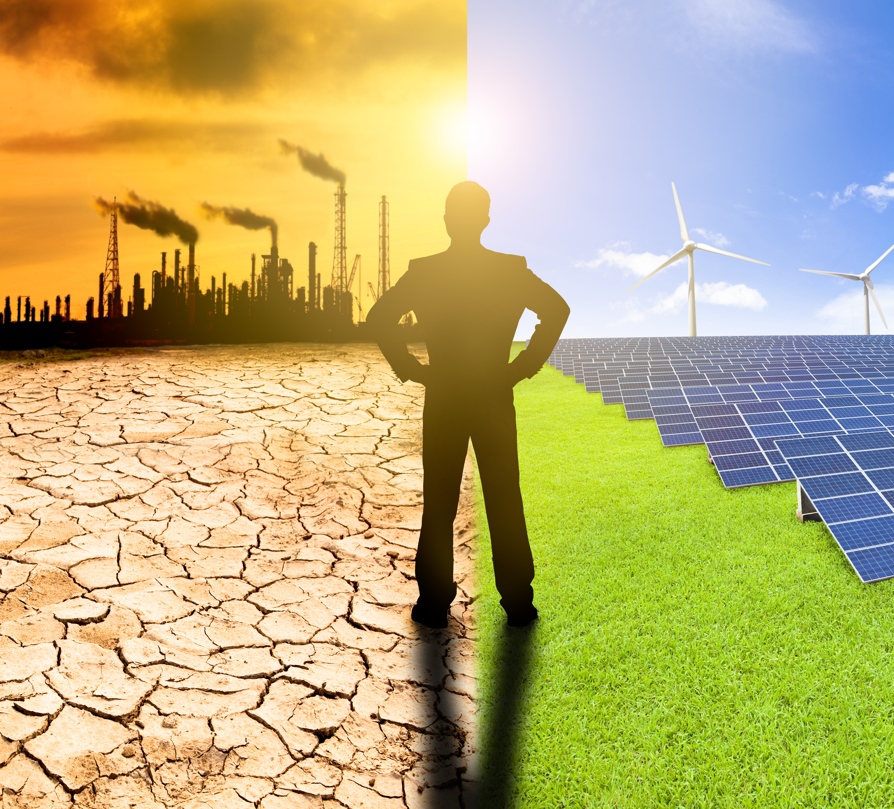 Man standing between a polluted desert and a green field with solar panels and wind turbines.